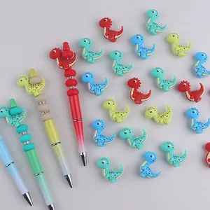 Bolígrafos de cuentas de dinosaurios DIY coloridos con degradados brillantes y piezas de silicona