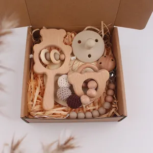 5-piece beech wood baby rattle set with bear teething ring and pacifier in a gift box