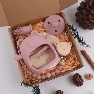 Coffret cadeau dentition bébé ours en silicone avec attache-tétine en bois et brosse