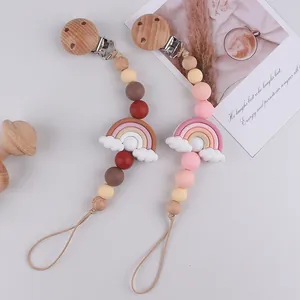 Handmade silicone rainbow pacifier clips set with natural wood and soft beads
