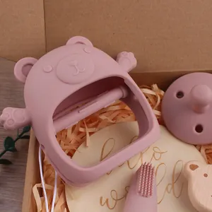 Coffret anneau de dentition ours en silicone rose avec sucette et jouet bois