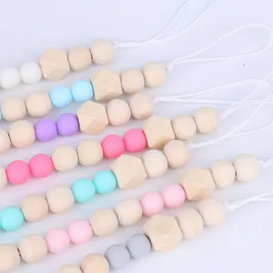 Handmade silicone and wooden pacifier clip chain with macaron colored beads and loop