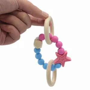 Massaggiagengive per neonati con perline in silicone anelli in legno e ciondolo a stella