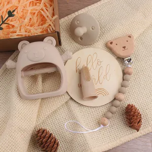 Détails du kit de dentition ours en silicone et attache en bois tons beige Morandi