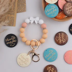 Detailed macro view of handmade wooden charm and silicone bead keychain with bow accessory