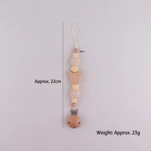 Handmade beech wood bear pacifier clip with silicone beads and crochet details