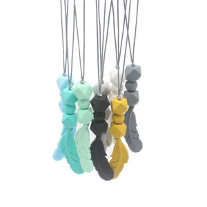 Silicone baby teething necklace with feather pendant in six soft colors