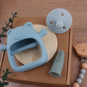 Détails du kit anneau de dentition ours en silicone et attache-tétine en bois