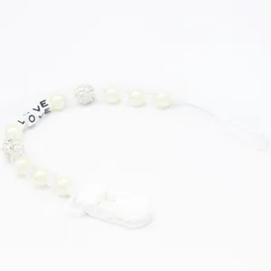 Custom baby pacifier clip with white pearls, LOVE letter beads and rhinestone crystals