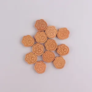 Detailed view of twelve natural wood cat paw beads for DIY handmade jewelry crafting