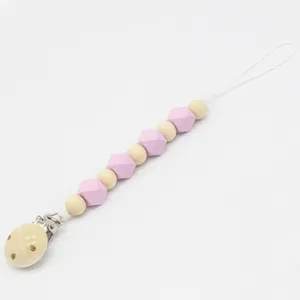 Attache-tétine en perles de silicone rose et bois avec clip métallique pour bébés