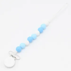 Silicone pacifier clip with blue and white beads for babies on a clean white background