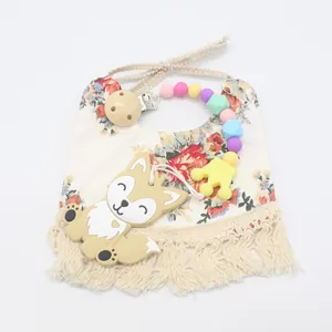 Baby gift set with floral tassel bib, fox silicone teether, and colorful bead pacifier clip