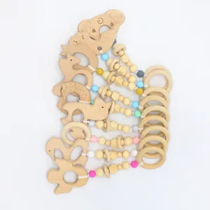 Set de jouets de dentition en hêtre avec formes d'animaux et perles en silicone colorées