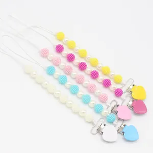 5-piece baby pacifier clip set with colorful beads and heart-shaped metal clasps