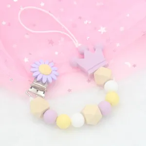Baby pacifier clip with purple crown, daisy metal clip, and colorful silicone beads