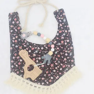 Baby silicone pacifier clip set with floral bib and wooden giraffe teething ring