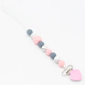 Silicone baby pacifier clip with pink heart metal clasp and marble texture beads