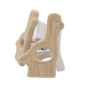 Detailed view of the giraffe-shaped wooden baby teether toy with smooth polished edges