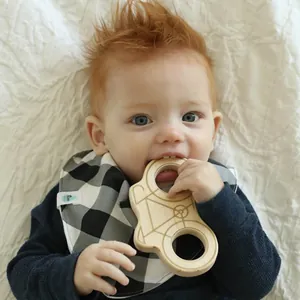 Natural beech wood camera teether and cotton checkered bib for baby soothing