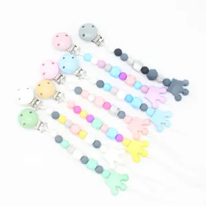 Silicone baby pacifier clips set with crown charms and macaron colored beads in six colors