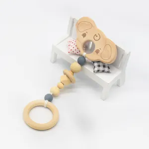 Anneau de dentition pour bébé en bois de hêtre et silicone avec motif koala mignon