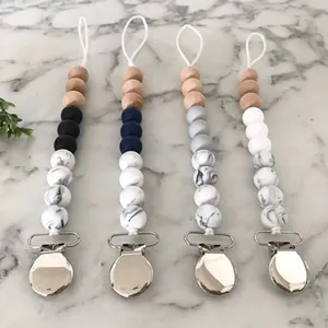 Set of 4 DIY silicone and beech wood baby pacifier clips in marble and solid colors