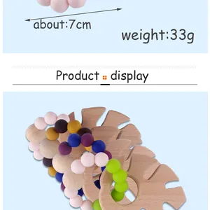 Detailansicht Beißring mit Silikonperlen und Buchenholzblatt, 7cm Durchmesser und 33g Gewicht