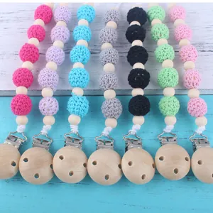 Set de sujetachupetes con cuentas de madera natural y cadenas de algodón tejidas a ganchillo