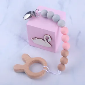 DIY baby pacifier clip with silicone and beech wood beads for teething relief