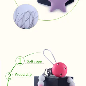 Detalle de cuerda de fibra suave y clip de madera rosa en cadena de chupete de silicona