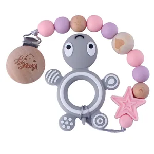 Silikon Schnullerkette mit Holzklipp und grauem Schildkröten Beißring für Babys