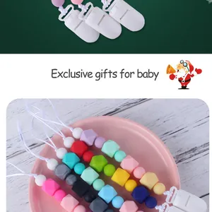 Detail of colorful silicone pacifier clip with macaron beads and secure plastic clasp