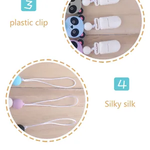 Detalle del sujetachupetes con clip de plástico y cordón de seda resistente para bebés