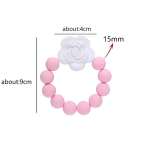 Massaggiagengive in silicone rosa con perle da 15mm e design a rosa bianca 4cm