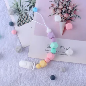 Pastel silicone pacifier clip chain with macaron beads and white plastic safety clasp