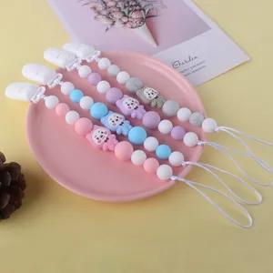 Sujeta chupetes de silicona con cuentas de oso en colores rosa azul y morado