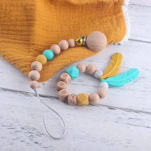 Baby Schnullerkette Set aus Buchenholz und Silikon mit Beißring und kleinem Glöckchen