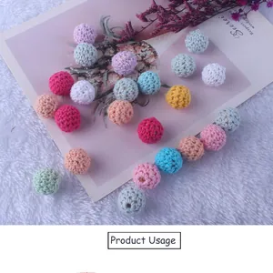 Colorful 16mm crochet cotton thread wooden beads on soft white fur for DIY jewelry craft