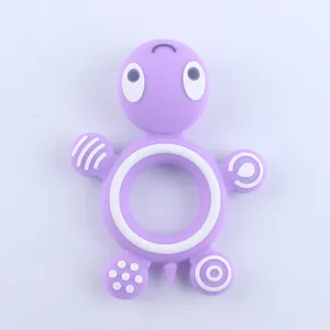 Purple turtle-shaped silicone baby teether ring with textured sensory massage surfaces