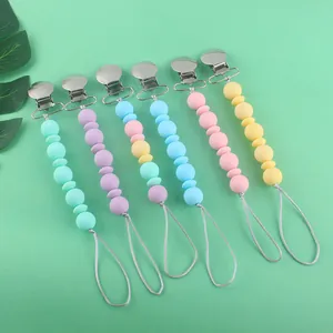 Lot de six attache-tétines en silicone pour bébé aux couleurs pastel macaron