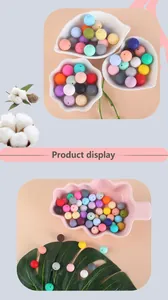 Detailed view of colorful 15mm silicone beads for DIY pacifier clips and teething jewelry