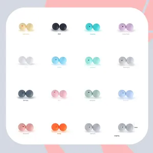 Macro view of 15mm silicone beads in 15 assorted colors for DIY teething pacifier clips