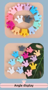 Macro shot of colorful crown silicone beads for DIY pacifier clips and teething bracelets