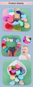 Macro shot of colorful heart-shaped silicone beads for DIY baby pacifier clips and teething toys