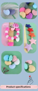 Macro view of pastel heart and star silicone beads for DIY baby pacifier clips