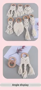 Detailed view of handmade cotton macrame teething rings with leaf-shaped woven patterns
