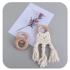 Handmade boho beech wood baby teether with woven cotton macrame tassel and rings