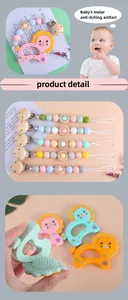 Detail view of colorful food-grade silicone lion teether and wooden pacifier clip chain