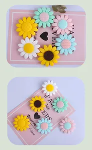Macro detail of sunflower silicone beads with grid texture in assorted pastel colors